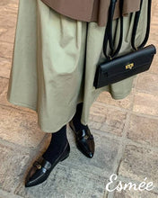 Load image into Gallery viewer, Black-Leather-Pointed-Toe-Loafers-with-Metallic-Flower-Design-model-shots1