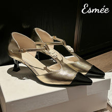 Load image into Gallery viewer, Gold-Leather-High-Heel-T-Straps-with-Flower-Design-and-Black-Toe-Cap-product-shots
