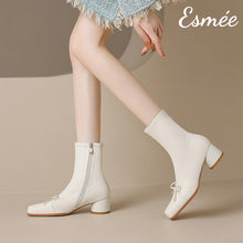 Load image into Gallery viewer, Ivory-Leather-Ankle-Boots-with-Bow-Knot-Design-model-shots
