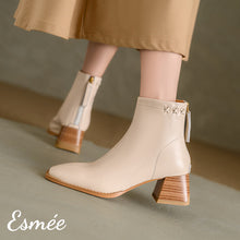 將圖片載入圖庫檢視器 Ivory-Leather-Ankle-Boots-with-Cross-Design-model-shots
