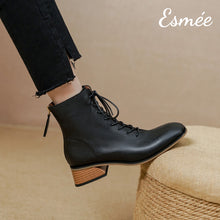 將圖片載入圖庫檢視器 Black-Leather-High-Heel-Marten-Boots-with-Round-Toe-Design-model-shots
